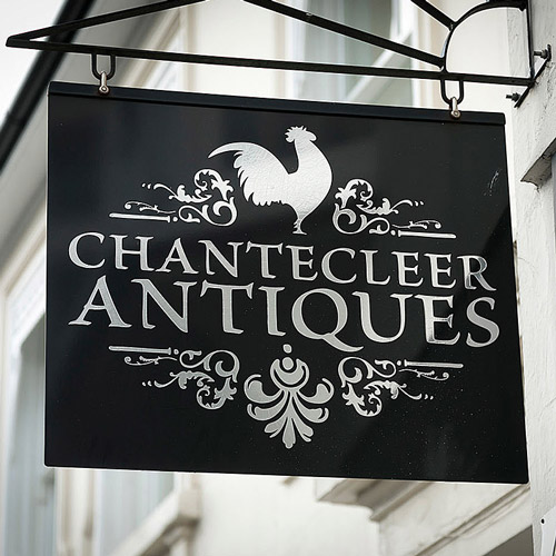 Chantecleer Antiques metal hanging sign